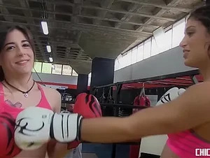 Hot public fuck with oiled up Spanish lesbians banging in the boxing ring